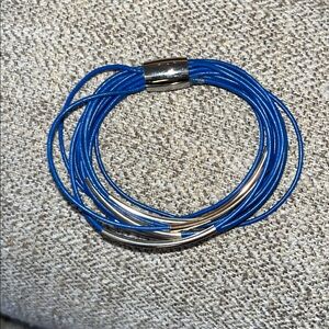 Bracelet with metal skinny stations .